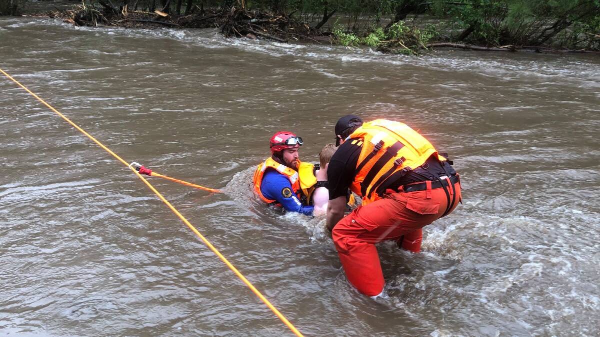 Saved: A teenage boy rescued from the Allyn River. Picture: SES 