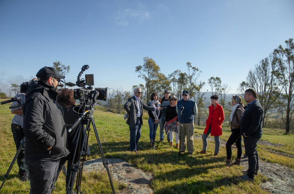 In The Spotlight: A group fighting the Brandy Hill quarry expansion speaking to reporters in June over concerns about koala habitat. Picture: Marina Neil 