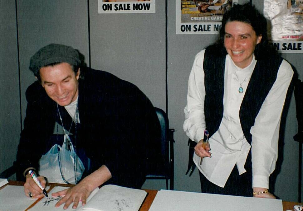 Sharon Davson with Baz Luhrmann recording his handprint in 1993. 