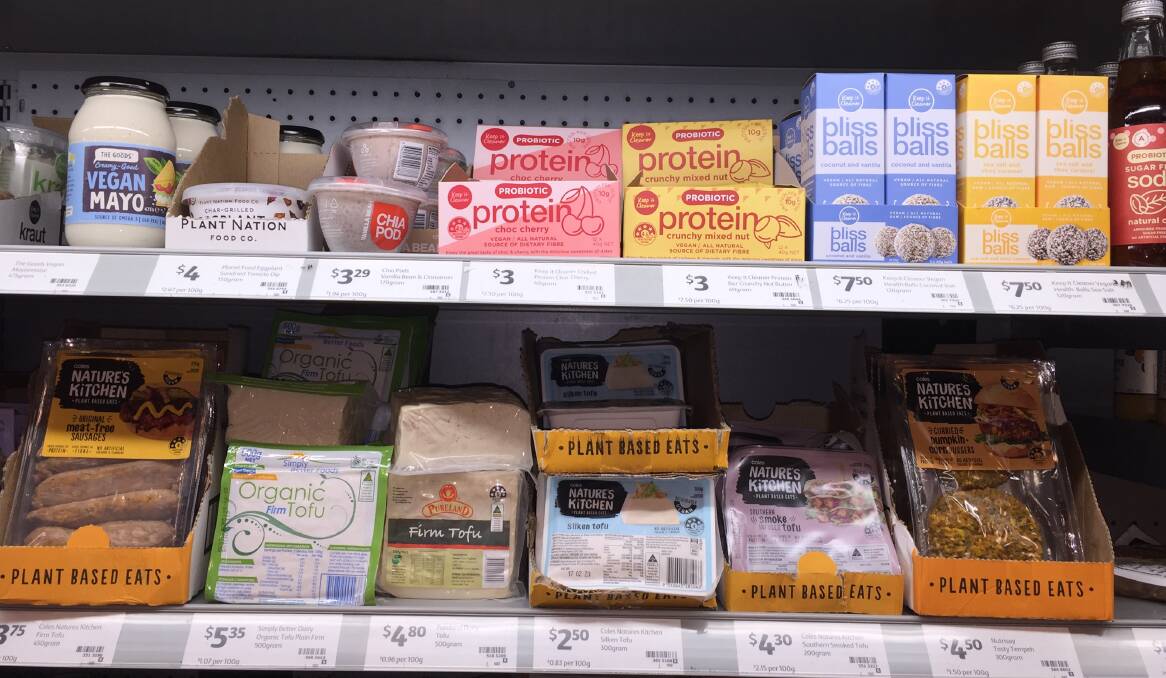 Food Choices: Supermarket shelves with plant-based and vegan products at a Coles outlet. While some packaged products can be relatively healthy, many are high in sugar, fat and salt and include synthetic and chemical additives. 