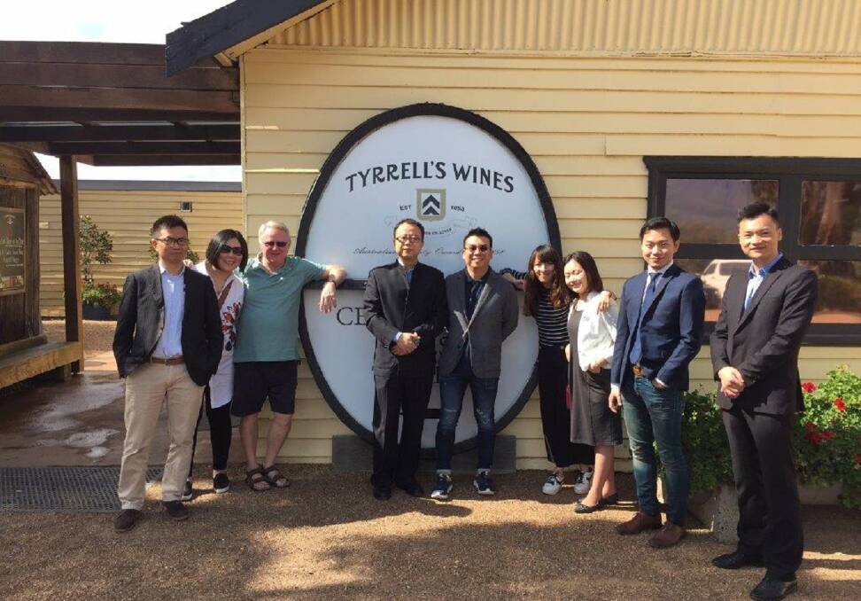 Sales: Bruce Tyrrell hosts a Pokolbin winery visit by a sales team from China a few years ago. Photo: Grant Bellve 