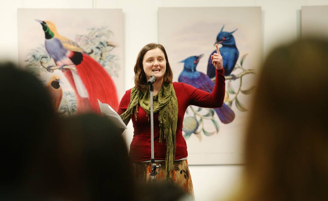 Poetic Licence: Rebecca Wilson at a poetry slam in Newcastle. The city's poetry culture is blossoming. Picture: Max Mason-Hubers  
