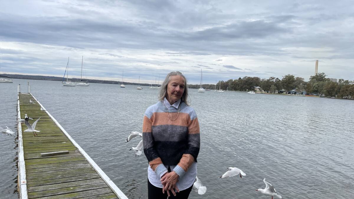 Sue Wynn at Mannering Park, with Vales Point Power Station in the background. Picture by Damon Cronshaw 