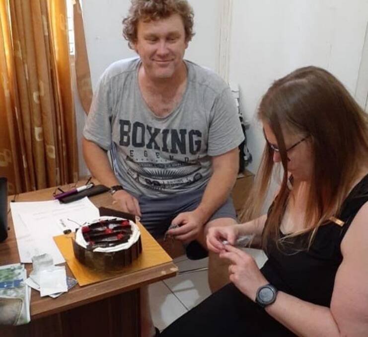 Detained: Michael Petersen and his wife Linda celebrated her birthday in police detention in Bali. He gave her a ring as a present. Picture: Nine News. 