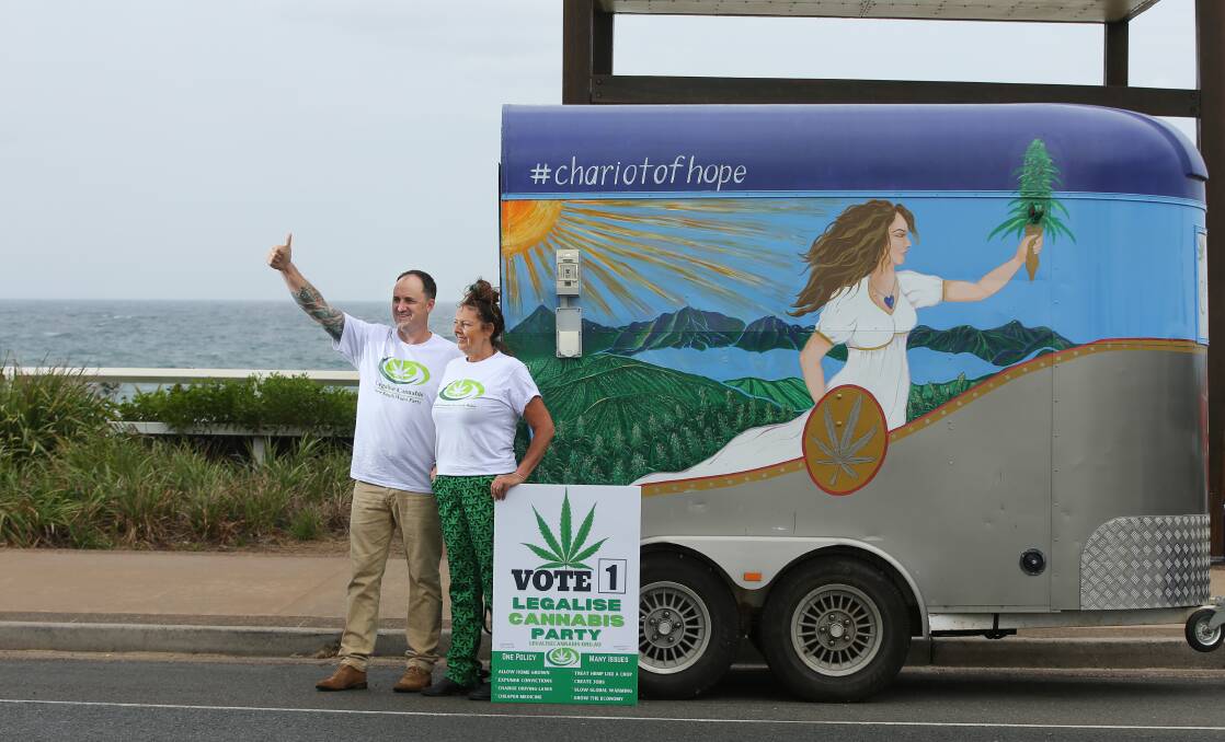 Jeremy Buckingham and Karen Burge, of the Legalise Cannabis Party, campaigning at Bar Beach in March last year. Picture by Simone De Peak 