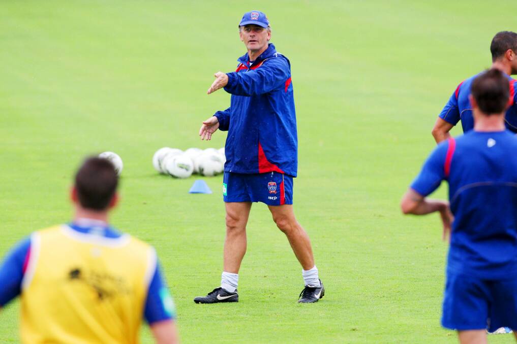 Gary van Egmond coaching the Newcastle Jets first team in 2012. He is now the club's academy director. Picture by Ryan Osland 