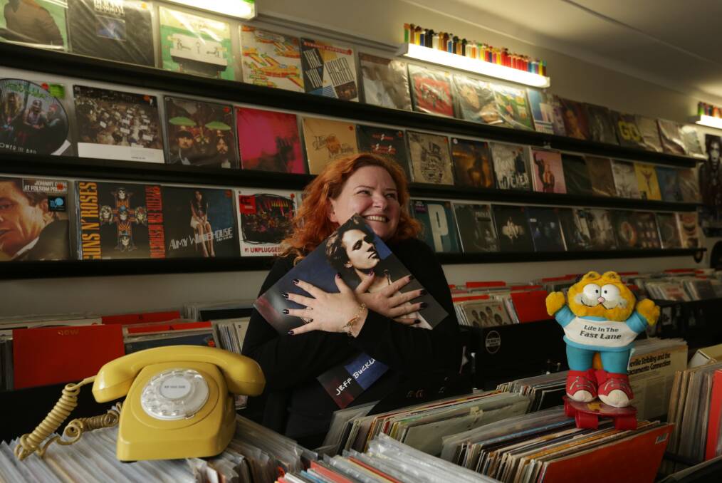 Retro: Kellie Jackson, of The Mosh Pit Record Store at Cardiff, loves vinyl and all things retro. Picture: Simone De Peak 