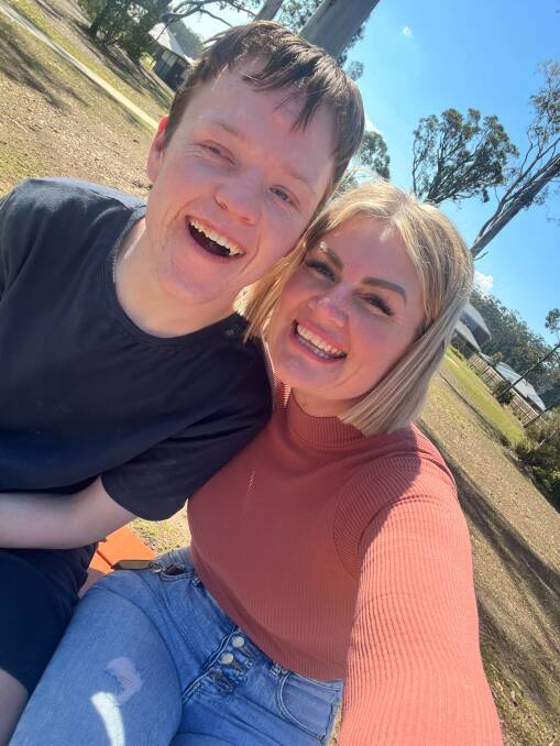 Live Your Best Life director Kristi Eastman with NDIS participant Asher. Picture supplied 