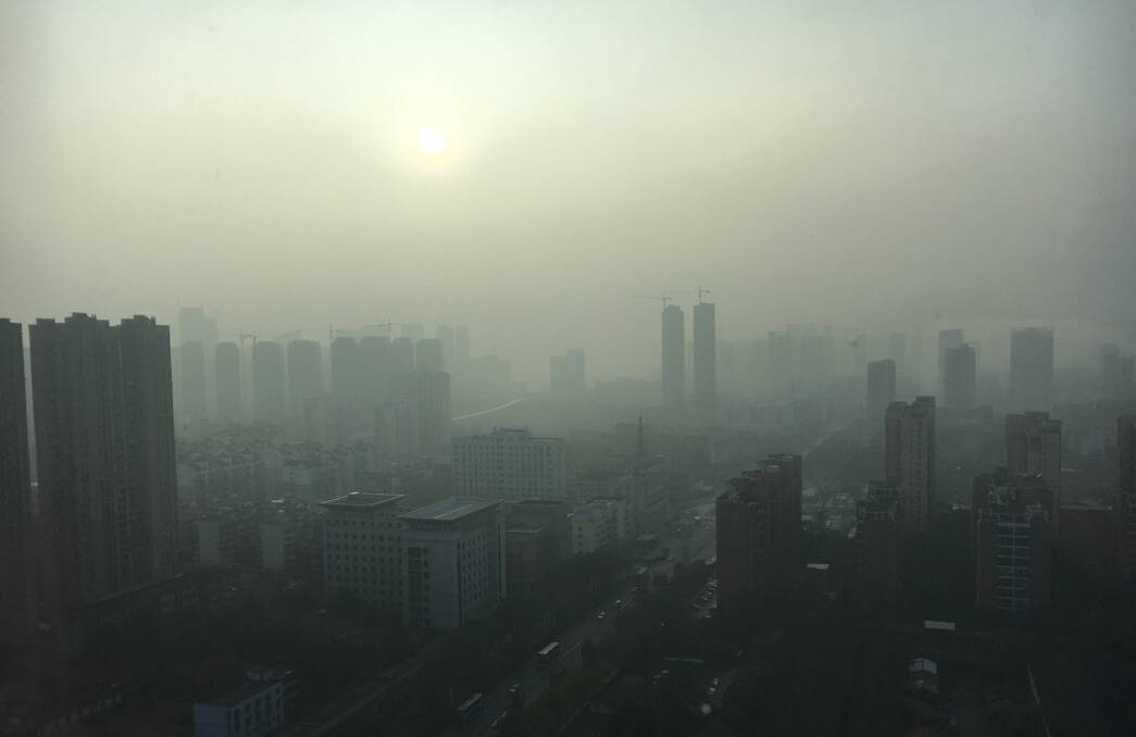 Polluted: Smog shrouding Wuhan, the capital of central China's Hubei province, also known as the epicentre of the COVID-19 outbreak. 