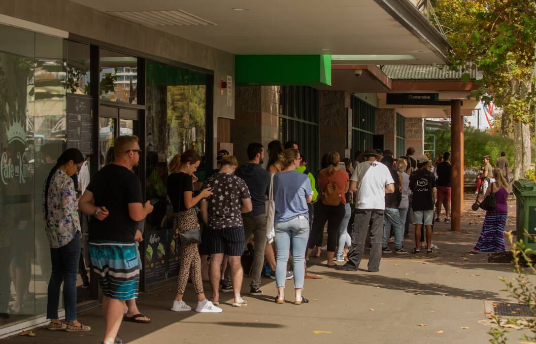 Out Of Work: Queues at Centrelink in King Street in Newcastle on March 23. Picture: Marina Neil 
