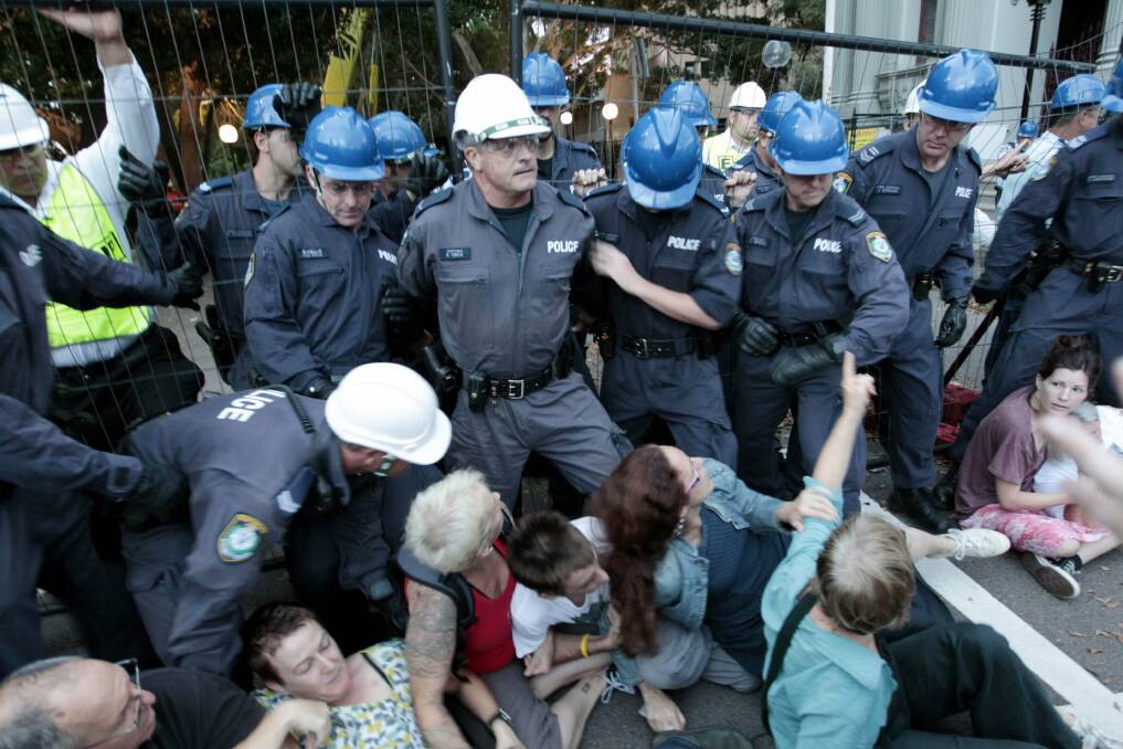 Protest: Police clash with protesters in Laman Street. Picture: Darren Pateman 