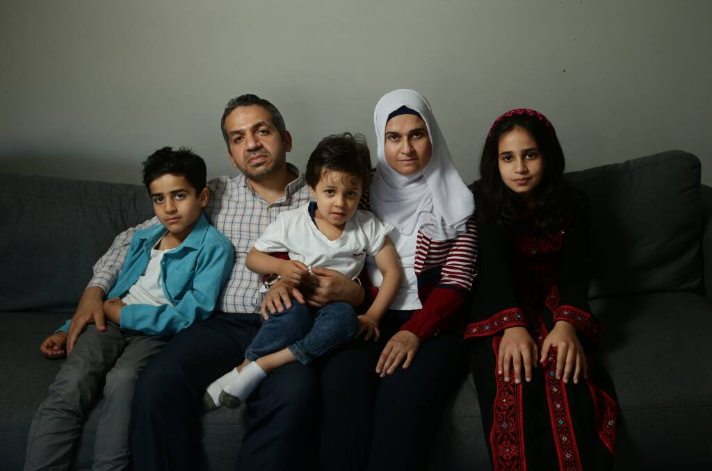 Mohamed and Safa Elosmany with their children Yousuf, 7, Omar, 3 and Hala, 9. They have Palestinian heritage and family in Gaza. Picture by Simone De Peak 
