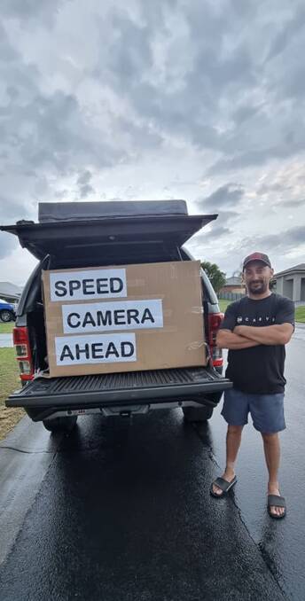 Speed Trap: Carl Dimarzo with the sign that's helping save motorists hundreds of dollars in fines. 