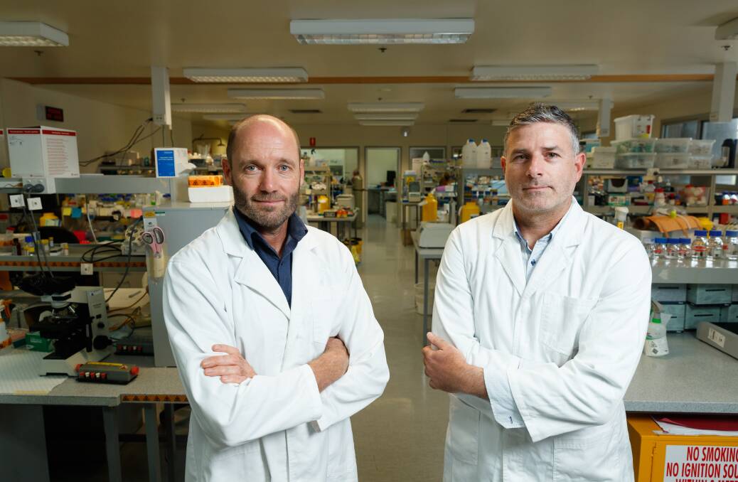 Sperm Science: University of Newcastle researchers Professor Brett Nixon and Dr Geoffry De Iuliis. Picture: Max Mason-Hubers 