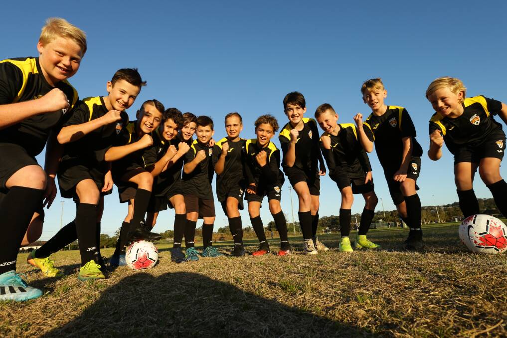 Aspirations: A Broadmeadow Magic youth team. Picture: Jonathan Carroll 