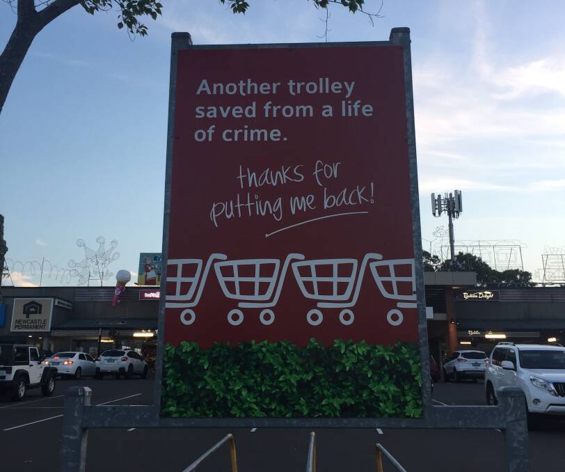 A sign about trolleys at Waratah shops.  