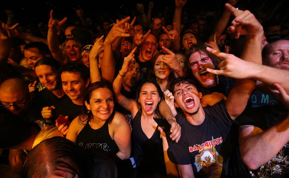 Rock On: Fans at the recent Iron Maiden gig in Brisbane. Picture: Chris Hyde.  