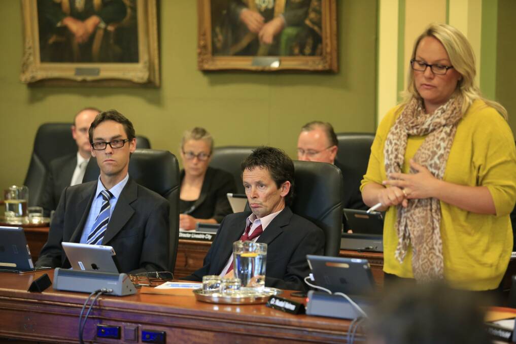 SEA CHANGE: Allan Robinson at the first council meeting chaired by Jeff McCloy as lord mayor in October 2012, flanked by Labor's Jason Dunn and Nuatali Nelmes. Picture: Peter Stoop