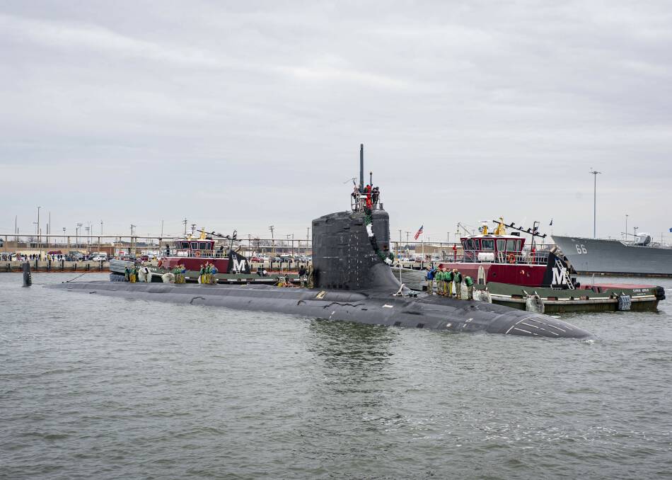 A Virginia Class fast attack submarine USS Washington returns to Naval Station Norfolk in Virginia after six months at sea. Picture by Mass Communications Specialist First Class Cameron Stoner