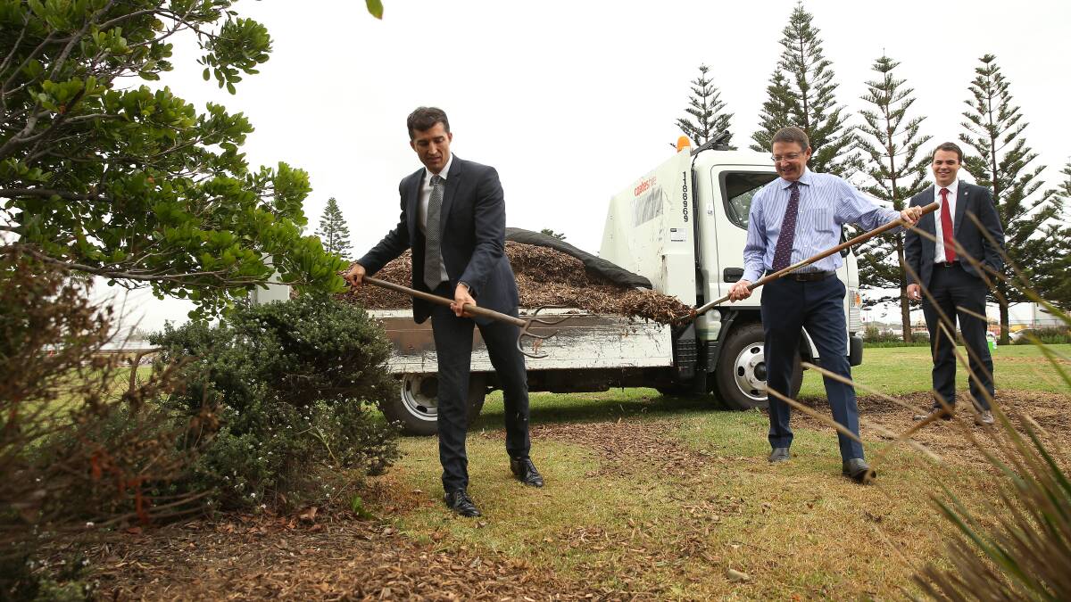 Newcastle City Council chief executive Jeremy Bath (left), Parliamentary Secretary for the Hunter, Scot MacDonald, and Newcastle Deputy Lord Mayor Declan Clasuen, at the announcement of a council plan to build a green waste recycling plant at Summerhill. Picture: Marina Neil