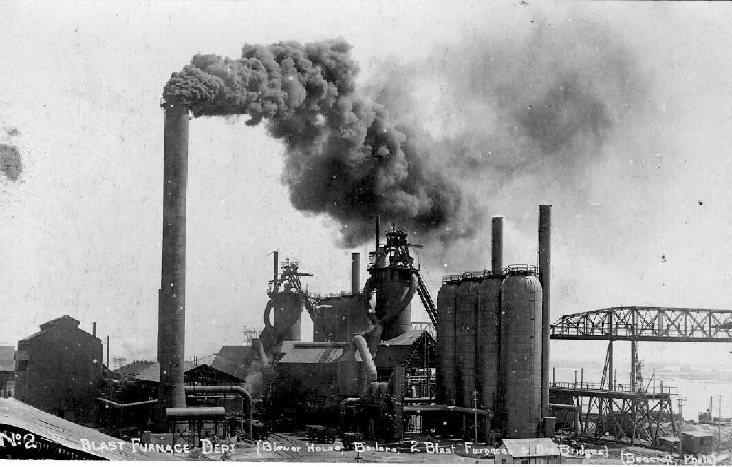 SMOKE SIGNALS: 1918 photo of No2 blast furnace, showing blower house, boilers, furnace and ore bridges. Courtesy: Newcastle Industrial Heritage Association