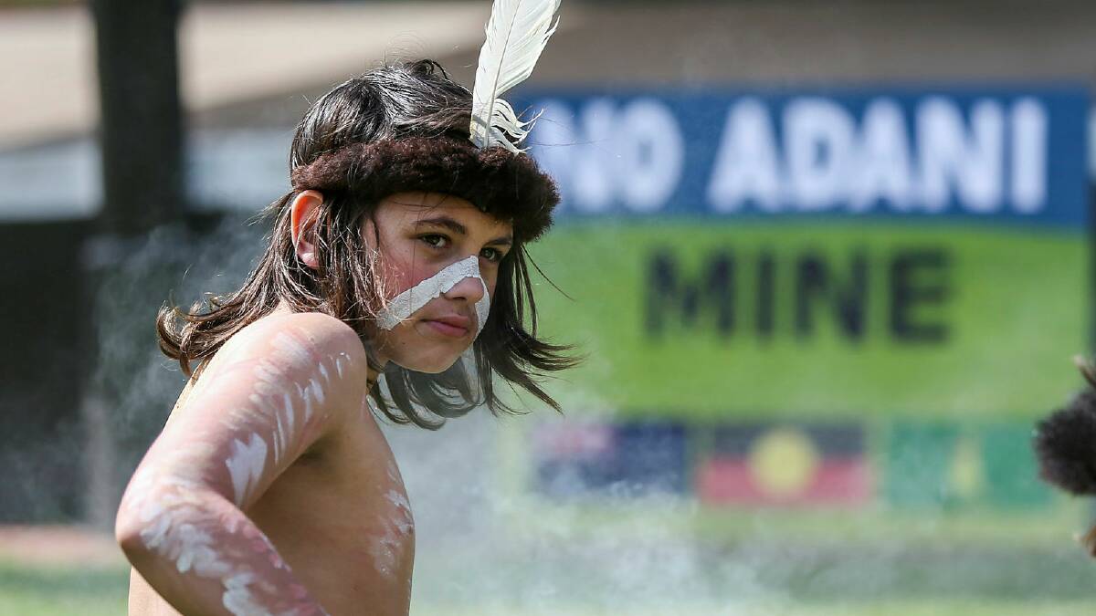 A teenager in a Victorian protest against Adani in 2017. Picture by Morgan Hancock
