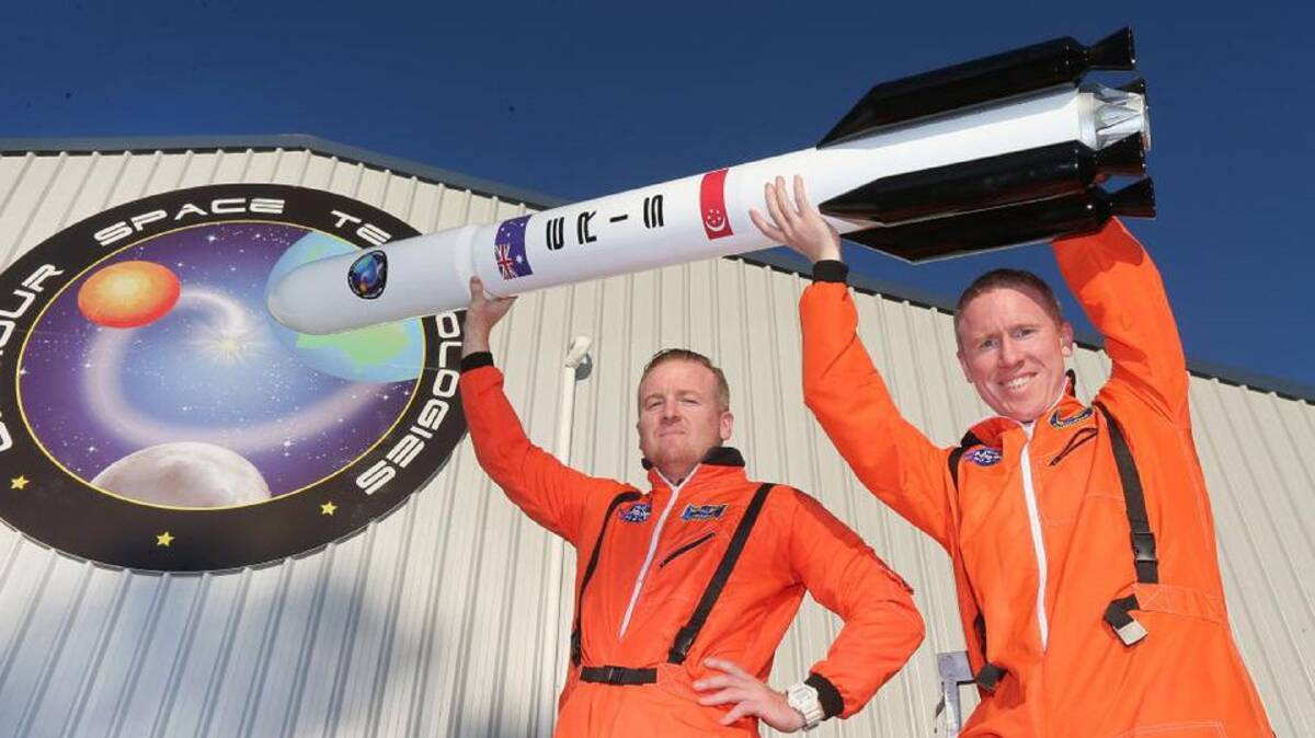 ROCKET MEN: Australian rocket company Gilmour Space with with founder Adam Gilmour, right, and his brother James. Based in Queensland, but hailing from a Hunter Coalfields family. Picture: Gilmour Space
