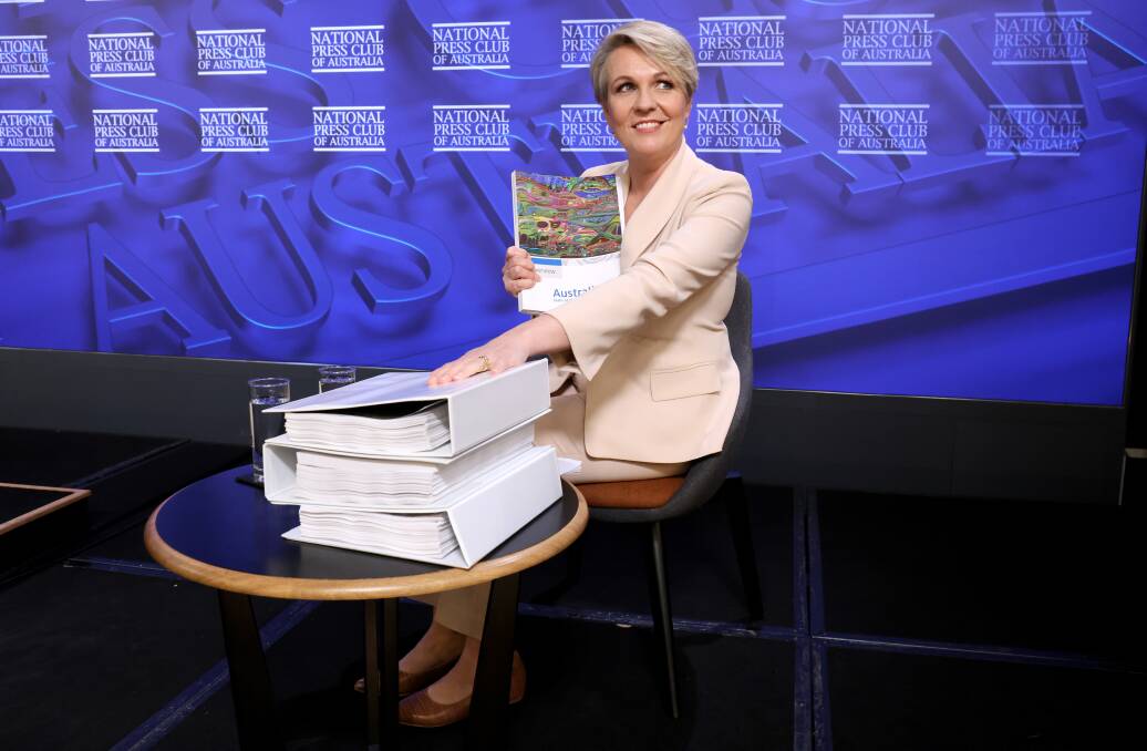PRESENTATION TIME: Environment Minister Tanya Plibersek goes through the motions yesterday posing for photographers and camera operators at the National Press club. Picture: James Croucher
