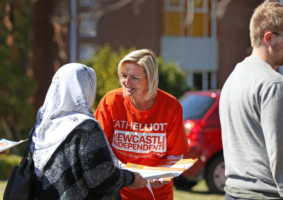 HOW TO VOTE: Kath Elliott campaigning in Newcastle before the 2017 elections that won her a place on the council. Picture: Stefan Moore