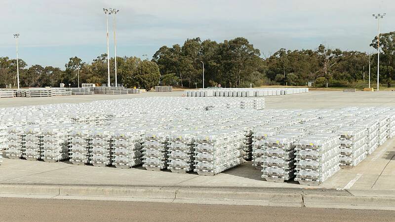TRENDING DOWN: Aluminium markets have fallen in recent months. This image shows a shipment of billets waiting to leave Tomago Aluminium in September last year. Picture: Max Mason-Hubers
