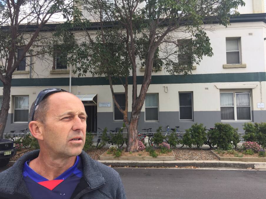  Aaron Buman outside the Carrington boarding house that was closed last month by Newcastle City Council.