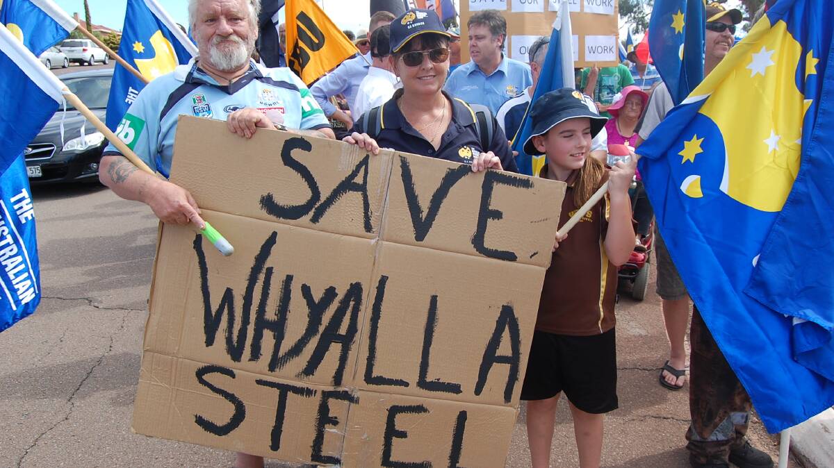 RALLY CRY: About 500 people hit the streets of Whyalla on Tuesday in support of the town’s embattled steelworks, which in turn feeds the OneSteel rolling mills in Newcastle. Picture: Louis Mayfield, Whyalla News.