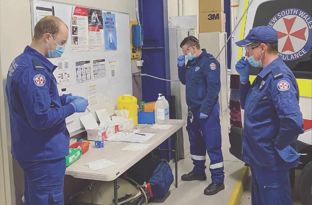 RAT RUN: NSW Ambulance officers use their Rapid Antigent Test (RAT) kits before work each day on the front lines of the COVID pandemic. Picture: NSW Ambulance