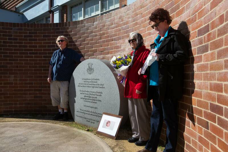 Geoffrey, Audrey and Bernadette Nash pause to remember Andrew Nash after yesterday's gathering. Picture: Marina Neil