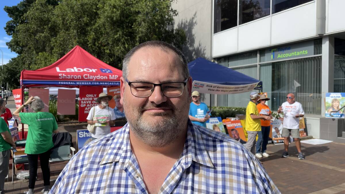 ON THE ROAD: Neil Roberts, of Blackalls Park, voted out of his electorate of Hunter at the Newcastle pre-poll in King Street. Travel on Saturday made a midweek vote easier. Picture: Ian Kirkwood