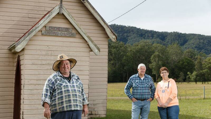 NOT HAPPY EITHER: John Lee and Dennis & Merle Turner, who would sell to Hunter Water but are united with their neighbours in saying the state government agency has them all in limbo while it decides what to do. Picture: Max Mason-Hubers