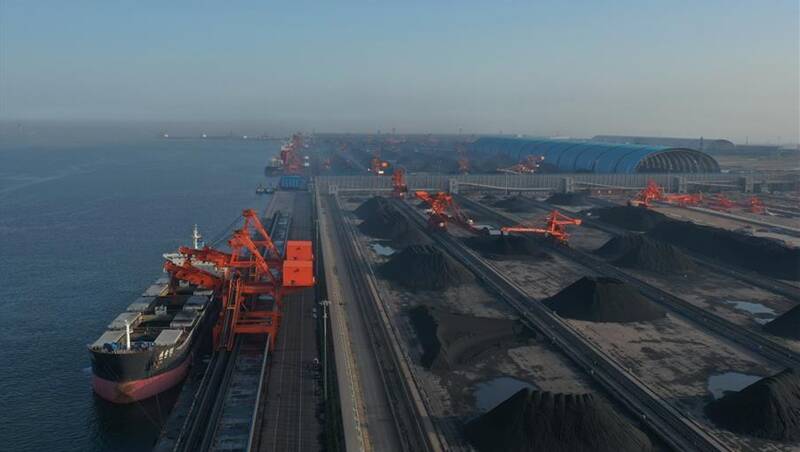 Caofeidian Port in northern China, unloading a ship importing coal.