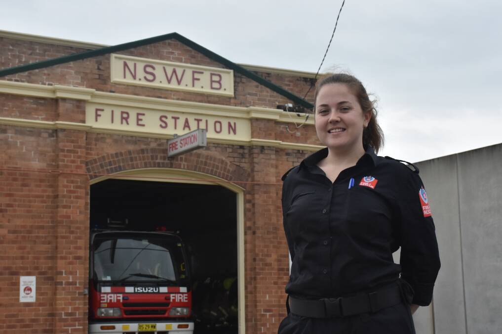 OLD AND THE NEW: The century-old Singleton Fire Station and crew member Megan Worth, one of two women among a dozen men in Singleton's crew of retained firefighters, pictured in 2020. They change inside, next to the truck.