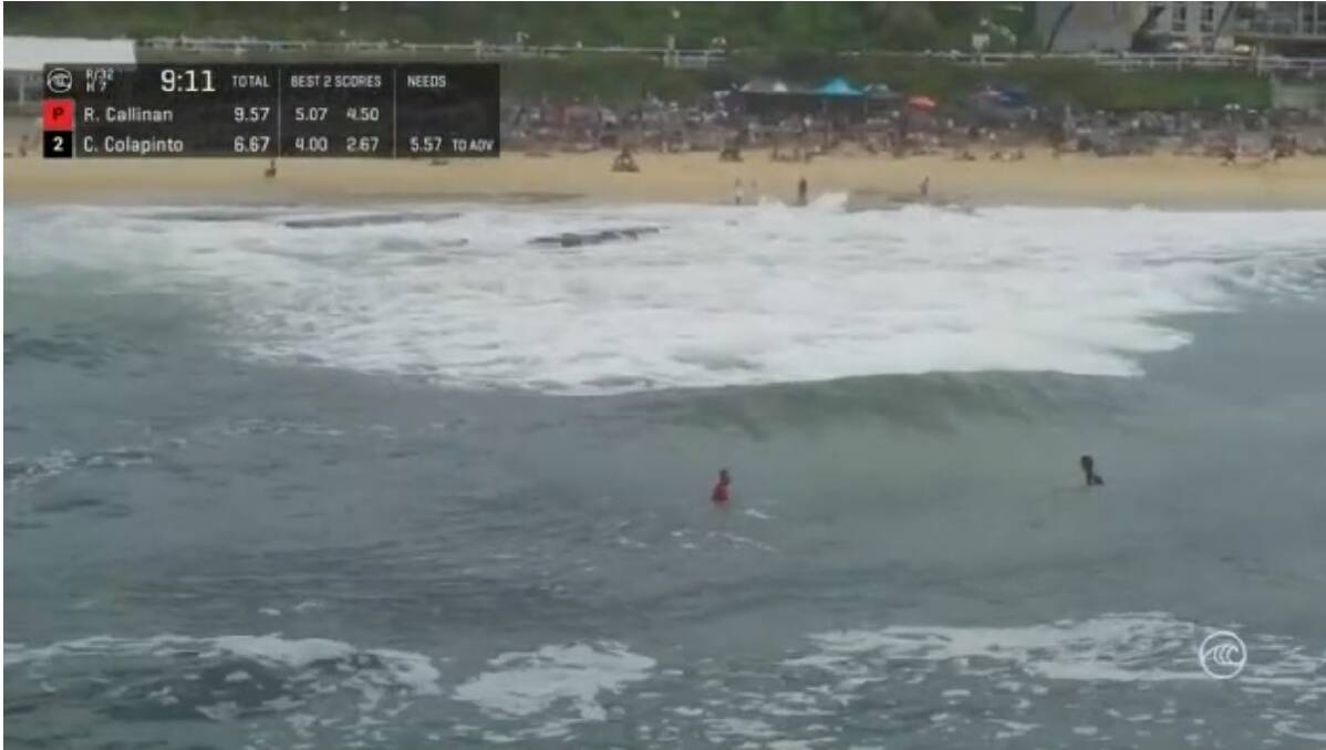 The drone view back to the beach as Ryan Callinan in red holds the inside, and priority, from his US rival, Crosby Colapinto, 19, one of the two 'Cola Brothers'. The other is Griffin Colapinto, 22.