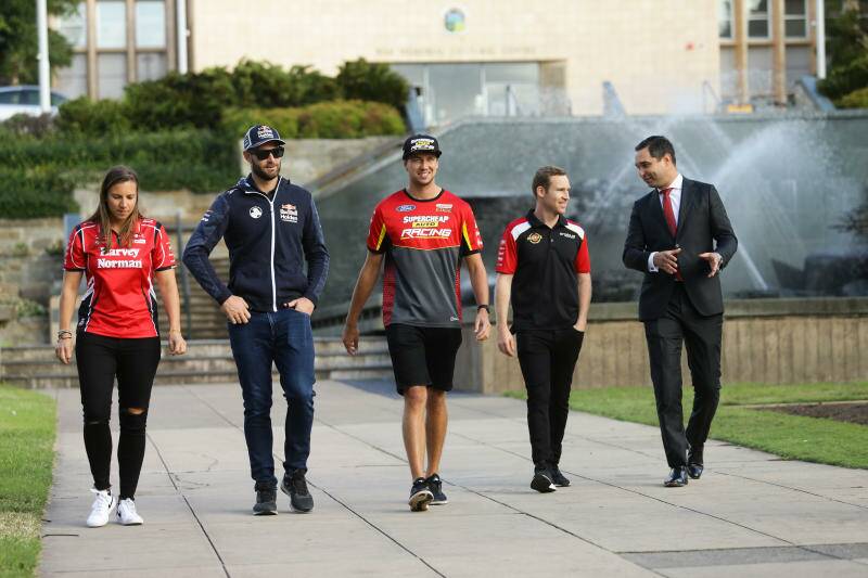 WALKING THE TALK: Supercars chief executive Sean Seamer, far right, in Newcastle in April 2018 with drivers Simona De Silvestro, Shane van Gisbergen, Chaz Mostert and David Reynolds. Picture: Jonathan Carroll 