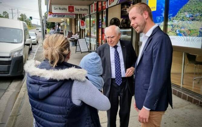 FAMILIAR FACE: John Howard in Morisset yesterday with Nationals candidate James Thomson.