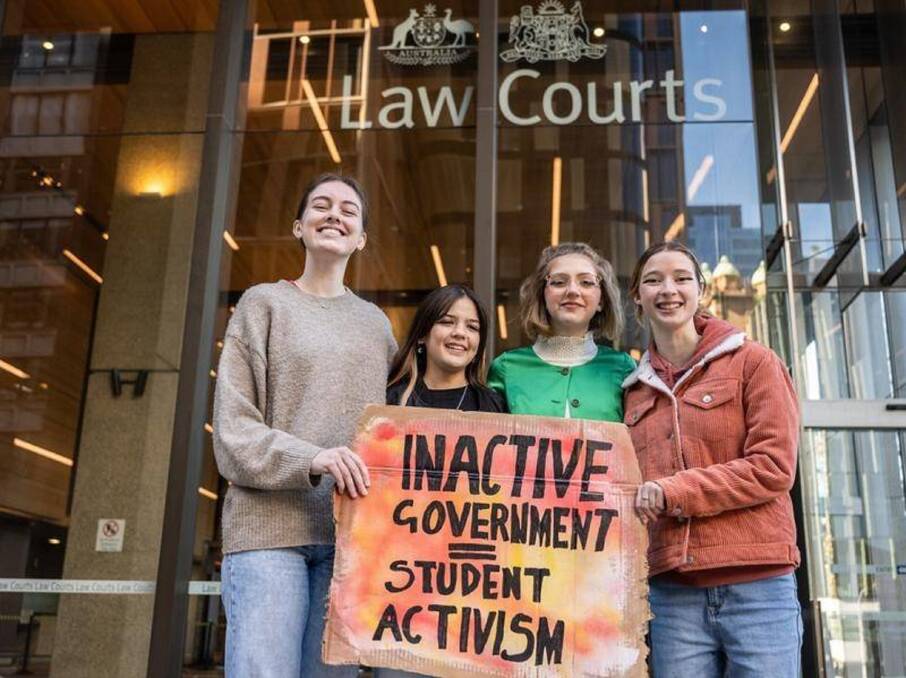 HEADLINE GRABBING: Laura Kirwin, Izzy Raj-Seppings, Ava Princi and Liv Heaton outside the Federal Court in May. Despite the industry's disavowal, environmentalists say yesterday's decision is a major blow to coal.