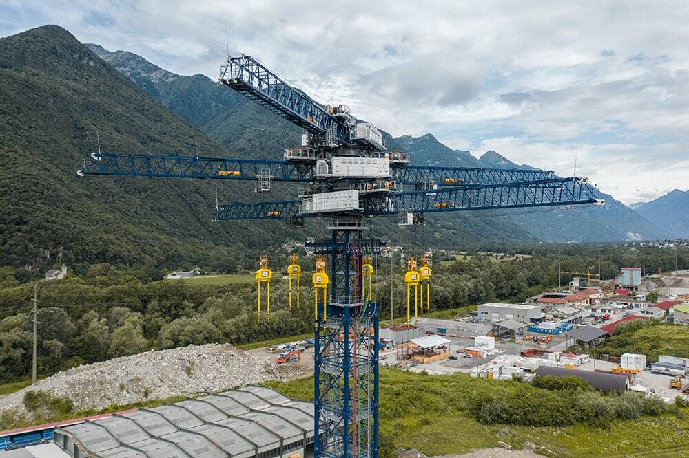 REAL WORLD: The Swiss demonstration plant. Concrete blocks are hoisted and lowered, held by the dangling yellow clamps.