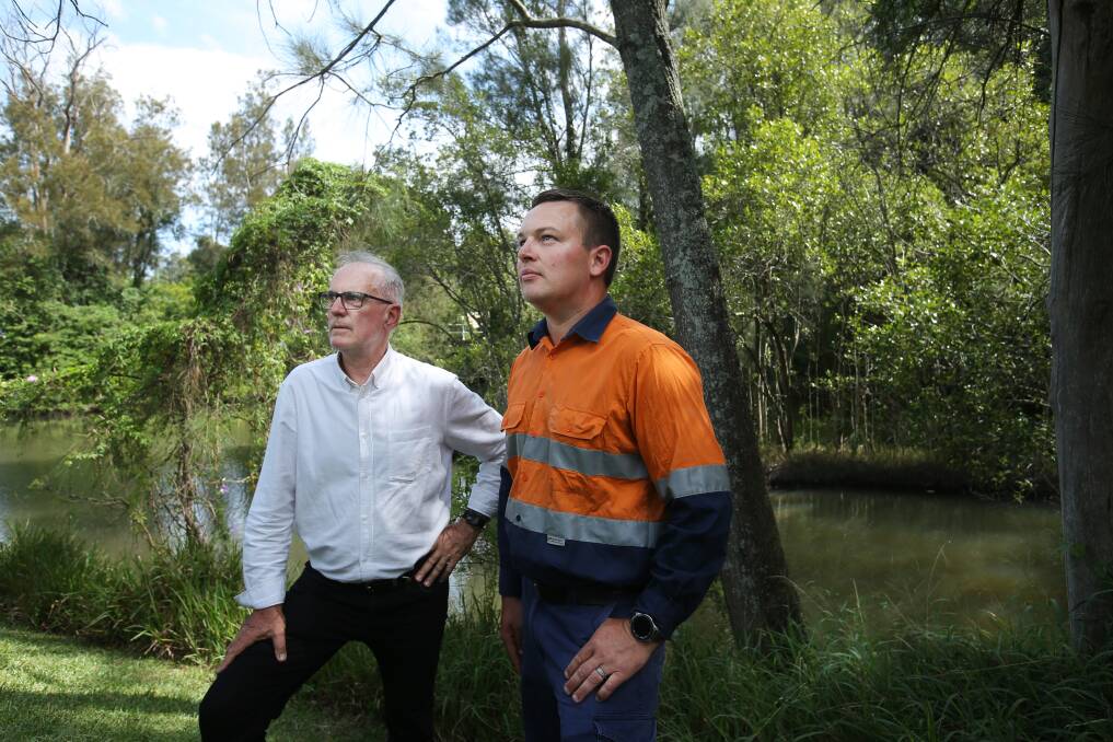Callan Delaney, right, with Lake Macquarie MP Greg Piper at LT Creek near Croft Oval, Fassifern, yesterday. Picture by Simone De Peak