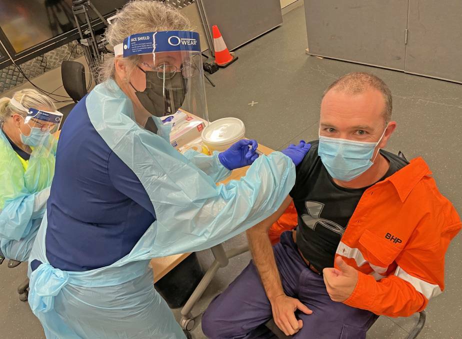 NOT THIS WAY: The Fair Work Commission has ruled against BHP's policy of refusing entry to unvaccinated workers at Mount Arthur mine at Muswellbrook. Here, mine manager Adam Lancey is vaccinated in September. Picture: BHP