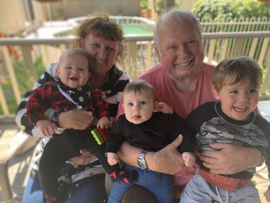 FROM GROMMET TO GRANDAD: Janelle and Roger Clements in 2019 with (left to right) Charlie, Logan and Parker. Zoey was born last year.