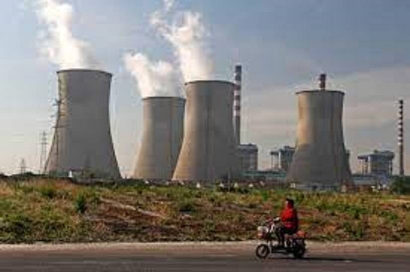 SPRAWLING FOOTPRINT: China consumes virtually half of the world's coal every year. One of its many coal-fired power stations and their cooling towers. Picture: Courtesy China Daily