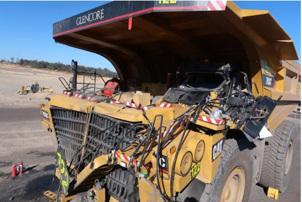 ACCIDENT AFTERMATH: Damage to the front and cabin of the 793C Caterpillar dump truck that ran into the rear of a similar, stationary, dump truck, on night-shift in July last year. Picture: Resources Regulator