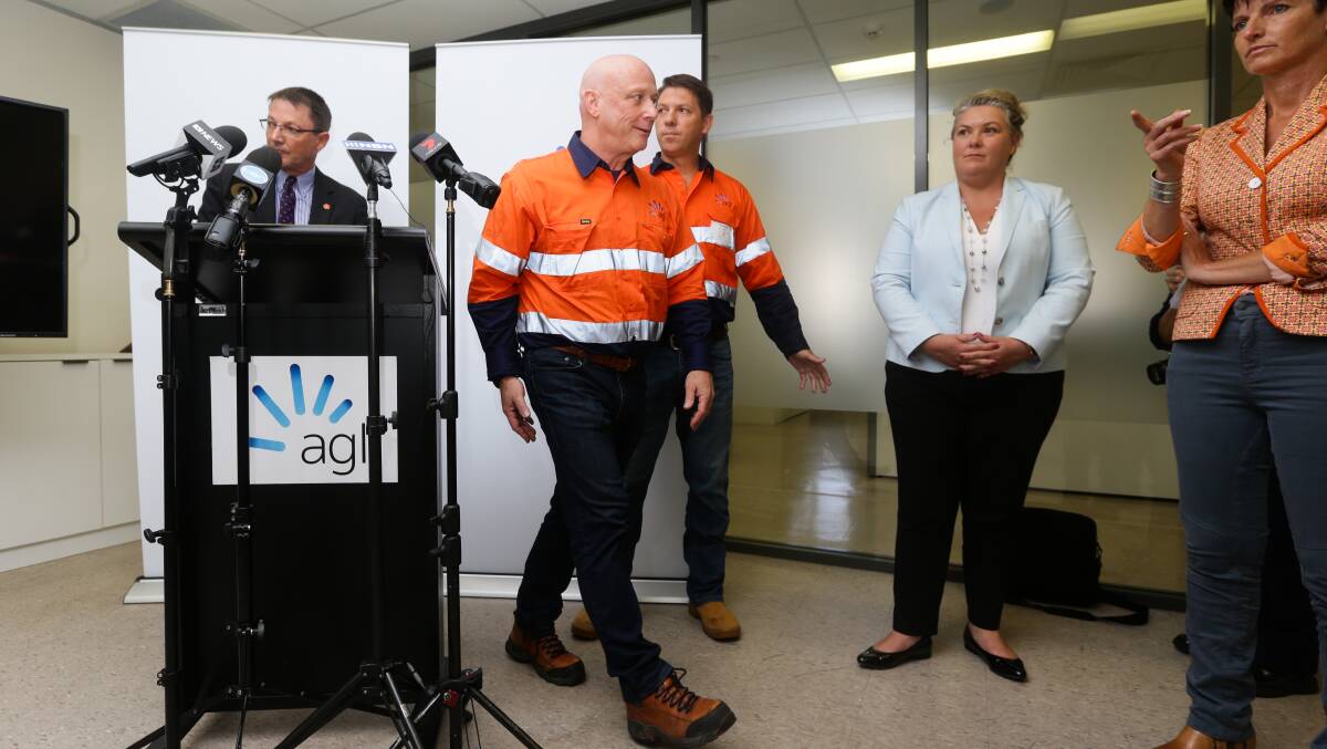 AGL CEO Andy Vesey at a recent press conference with Meryl Swanson in blue jacket.