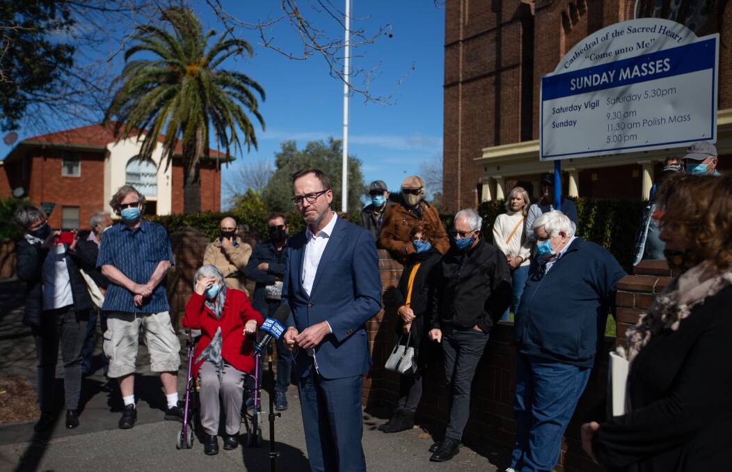 CLARION CALL: David Shoebridge MLC yesterday, with Audrey Nash, sitting, and her son Geoffrey, among a gathering of almost 50, calling for an inquiry into matters raised by journalist Suzanne Smith's new book, The Altar Boys. Picture: Marina Neil